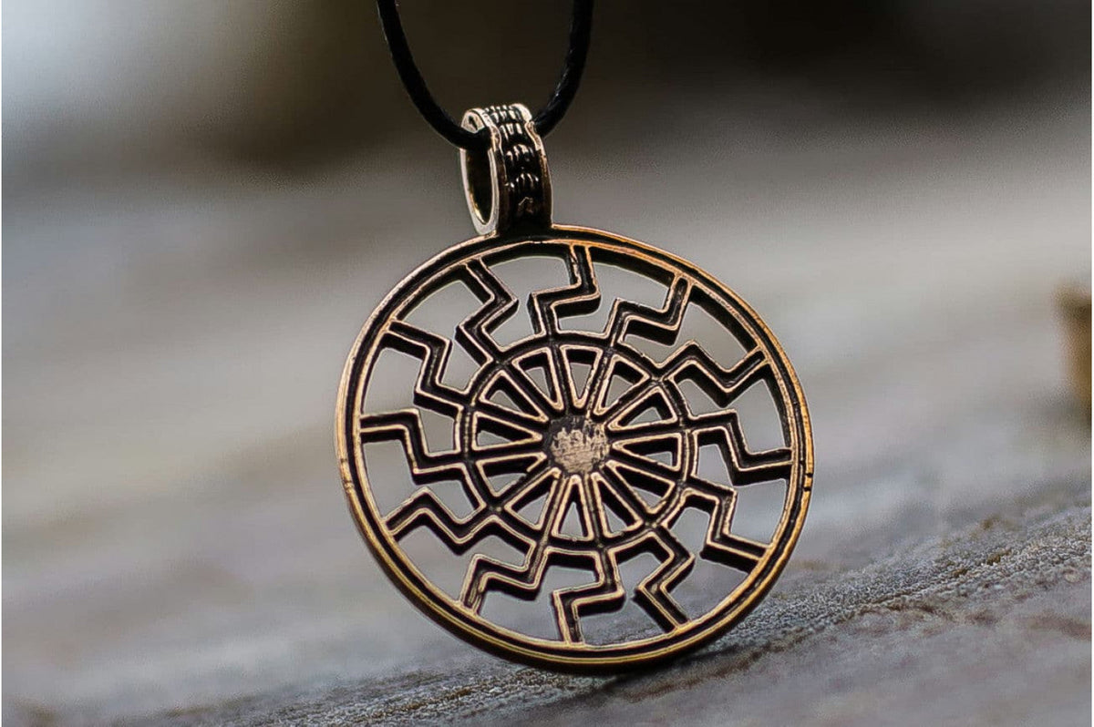Pendentif Soleil Noir Alva — Bronze